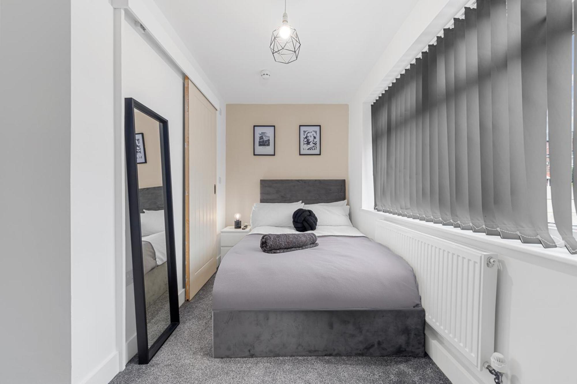 Проживание в семье Morden En-suite - Close Cente & Etihad Stadium *