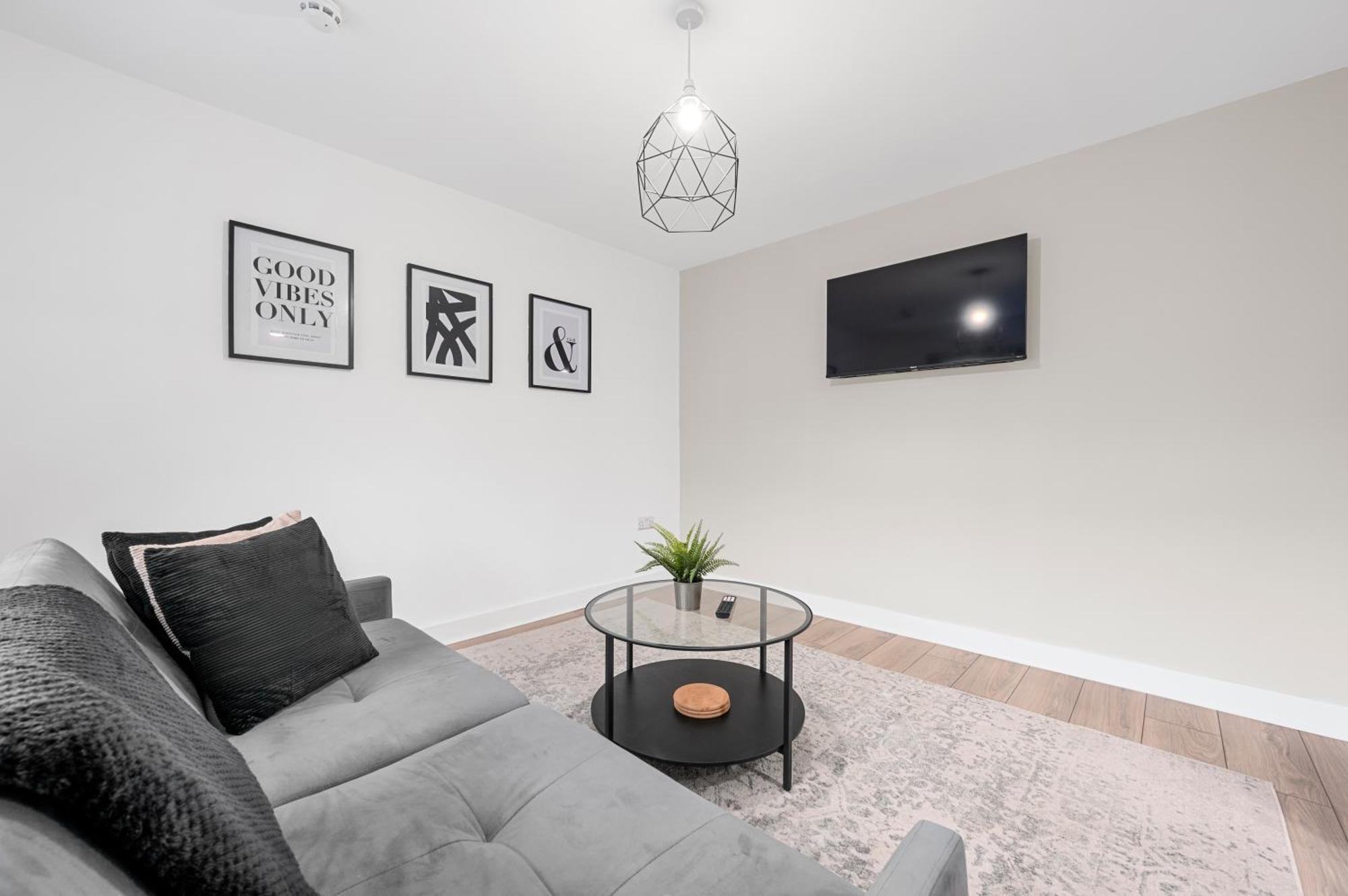 Проживание в семье Morden En-suite - Close Cente & Etihad Stadium *